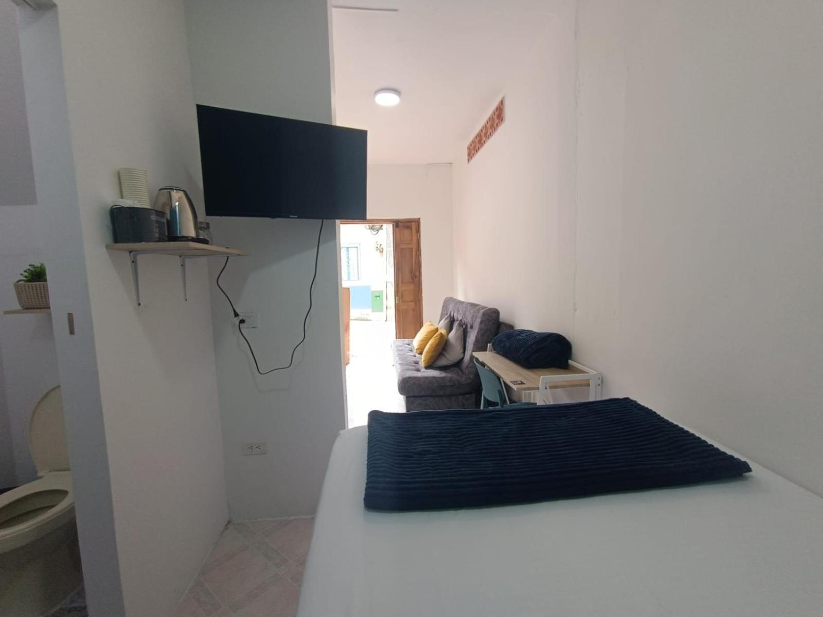 Confortable Habitacion En Apartamento Amoblado Jardín Exterior foto